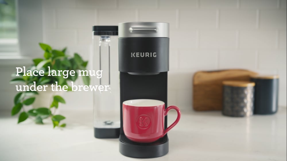 How do I use the descale button on my Keurig